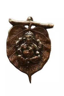 Metal wall hanging of Lord Ganesha on Leaf