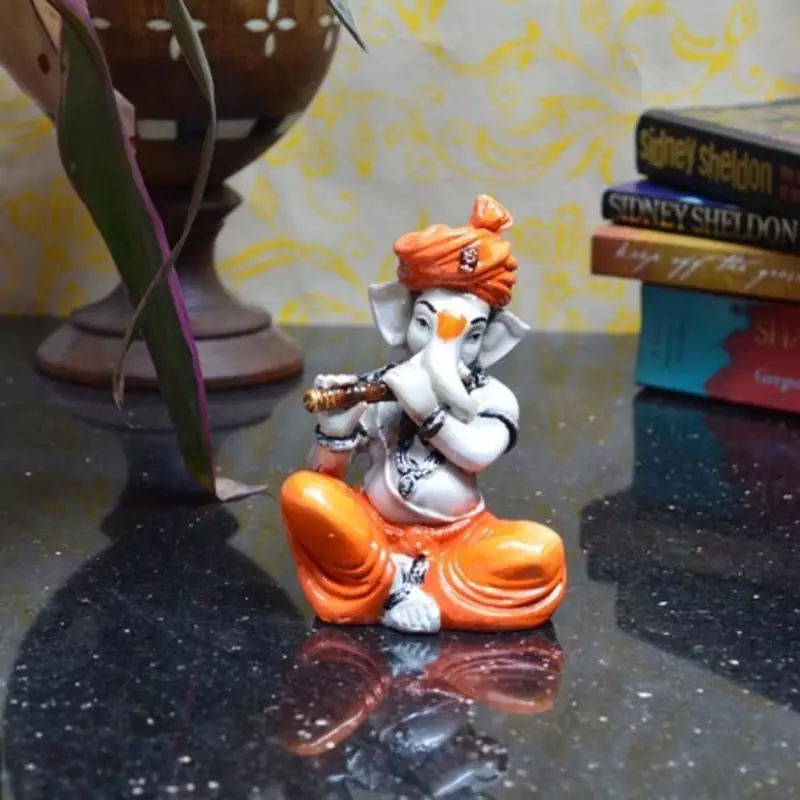 Lord Ganesha playing Flute