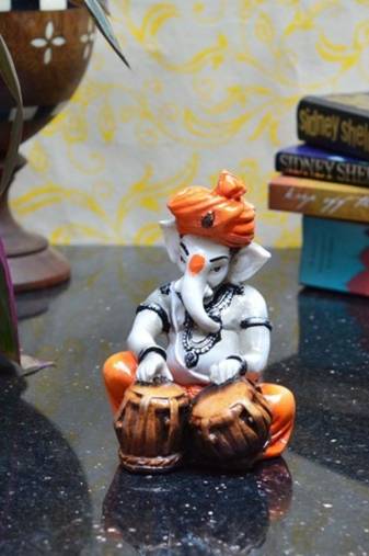 Lord Ganesha playing Tabla