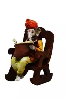 Lord Ganesha reading Book on Wooden Chair