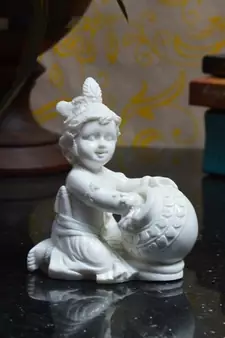 Pure White Statue of Laddu Gopal having Makhan
