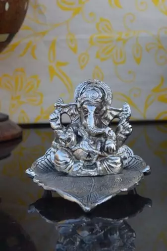 Silver Lord Ganesha Statue on Leaf