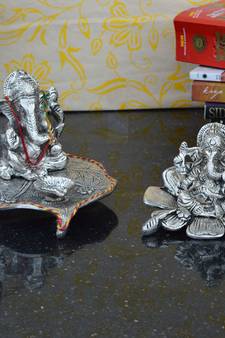 e craft india set of 2 ganesha statues with diya and flower design