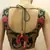 Pink and green embroidered blouse