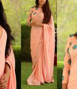 Peach embroidered georgette saree with blouse