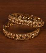 Gold plated gheru stone embellished copper made  bangles
