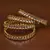 Gold plated gheru stone embellished copper made  bangles