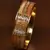 Gold plated feather and zircon embellished bracelet