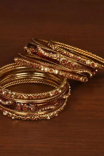 Gold plated zircon embellished meena-kari bangle set