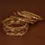 Gold plated zircon embellished meena-kari bangle set