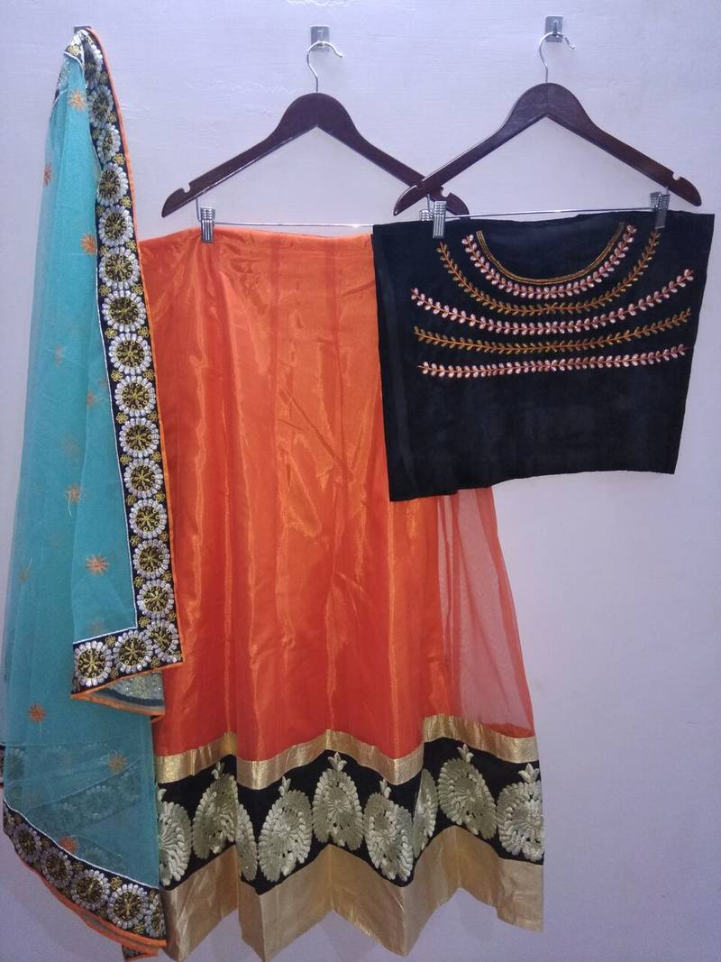 Orange embroidered silk semi-stitched lehenga choli with dupatta