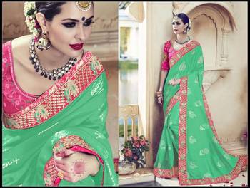 Green woven georgette saree with blouse 1