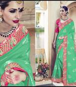 Green woven georgette saree with blouse