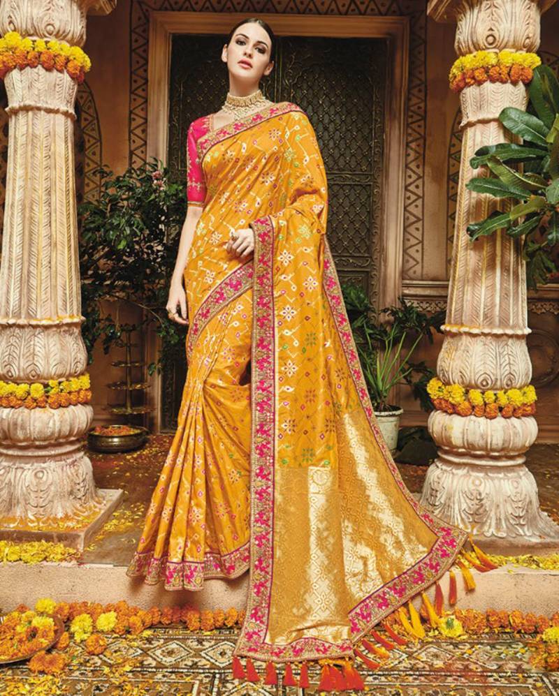 Yellow embroidered banarasi silk saree with blouse