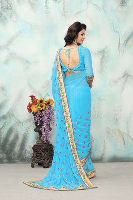 Sky blue embroidered georgette saree with blouse 3