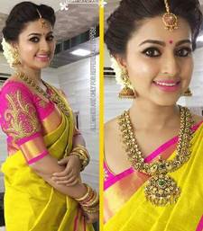 Yellow plain art silk saree with blouse