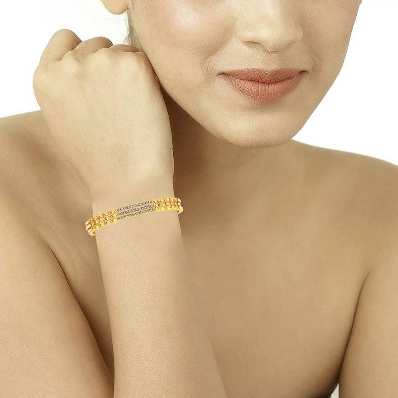Gold plated bangles and bracelets