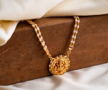 Pearl necklace with Laxmi pendant and rubies one gram gold 1