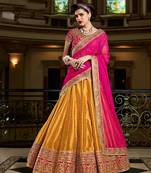 Yellow embroidered net semi stitched lehenga with dupatta