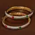 Ruby and Emerald Embellished Rich American Diamond Bangles for Women