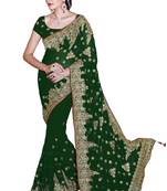Green embroidered faux georgette saree with blouse