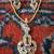 golden diamond pendant with matching earrings