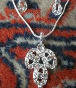 american diamond pendant in silver with matching earrings