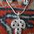american diamond pendant in silver with matching earrings