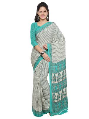 Beige printed crepe saree with blouse 1