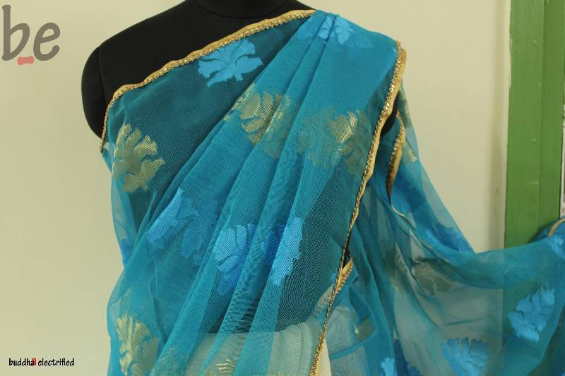 Ferozi banarsi Net- Cream Jute Tissue Saree