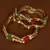 Gold Plated Red and Green Zircon Stone Worked Zigzag Style Bangles