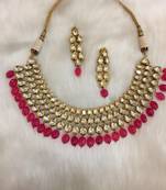Bridal look ruby and kundan necklace with matching earrings