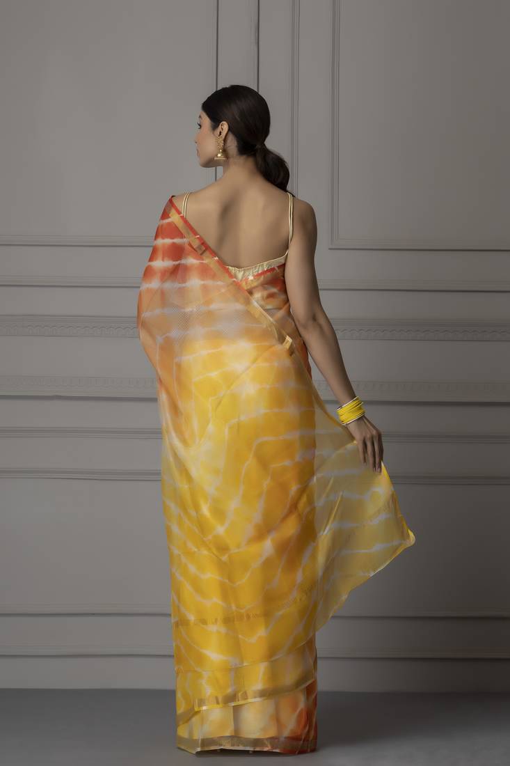 Yellow printed pure silk saree with blouse