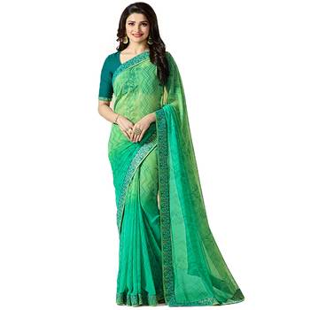 Green printed georgette saree with blouse 1