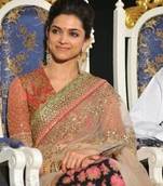 Deepika padukone half half saree at music launch party