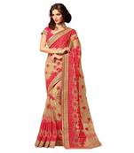 Beige embroidered net saree with blouse