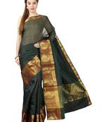 Dark green plain silk cotton saree with blouse
