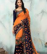 Orange embroidered silk saree with blouse