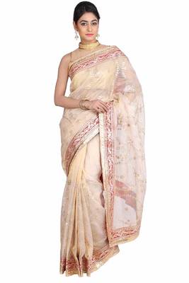 Golden embroidered pure tissue saree with blouse 1