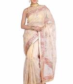 Golden embroidered pure tissue saree with blouse