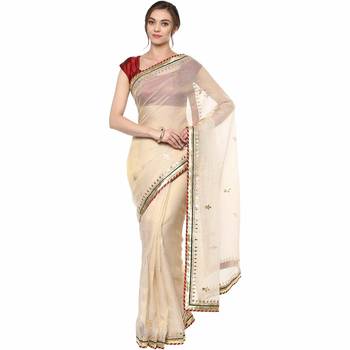 Beige embroidered tissue saree with blouse 1