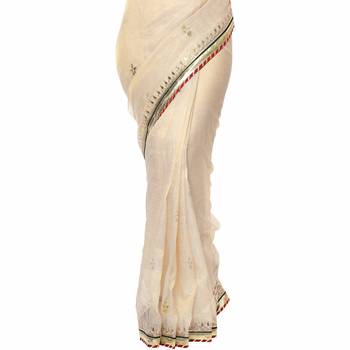 Beige embroidered tissue saree with blouse 5