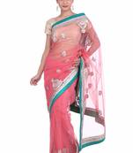 Pink embroidered net saree with blouse