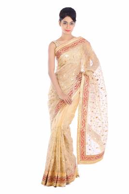 Beige embroidered pure tissue saree with blouse 1