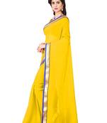 Yellow plain georgette saree with blouse