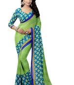 Green printed georgette saree with blouse