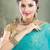 Sky blue georgette stoned worked saree in shimmering golden border