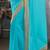 Sky blue georgette stoned worked saree in shimmering golden border