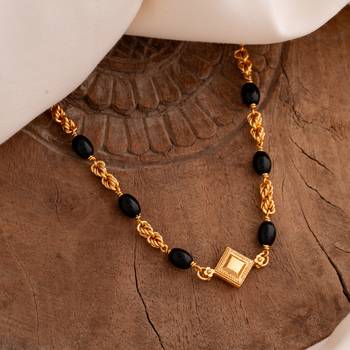Black beads and mushti (1+2)mangalsutra with diamond kasitali one gram gold 1