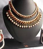 Buy two Maroon Pearl Polki Necklace Set